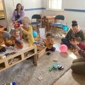 Image of families with children gathering at event