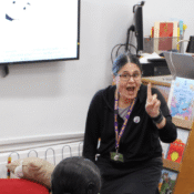Dr. Gale signing to the children