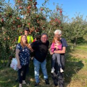 Image of family apple picking