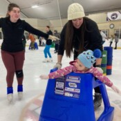 Picture of family ice skating.