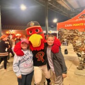 Image of families with mascot