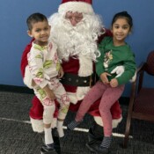 Children posing with Santa