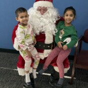 Children posing with Santa